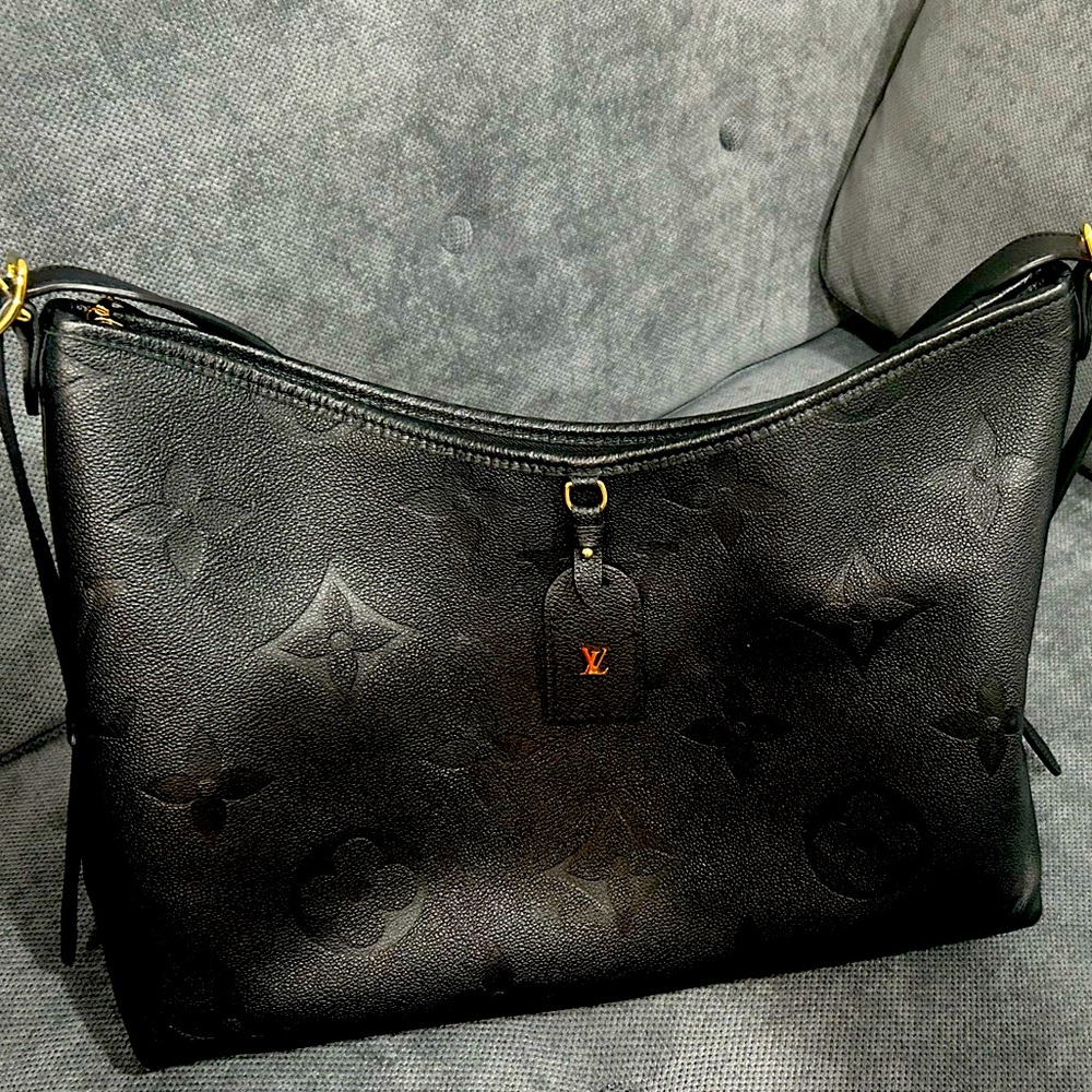 Authentic louis vuitton carryall MM